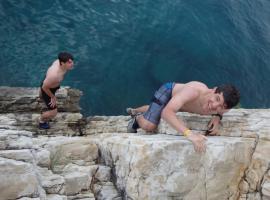 Race who will climb cliff first